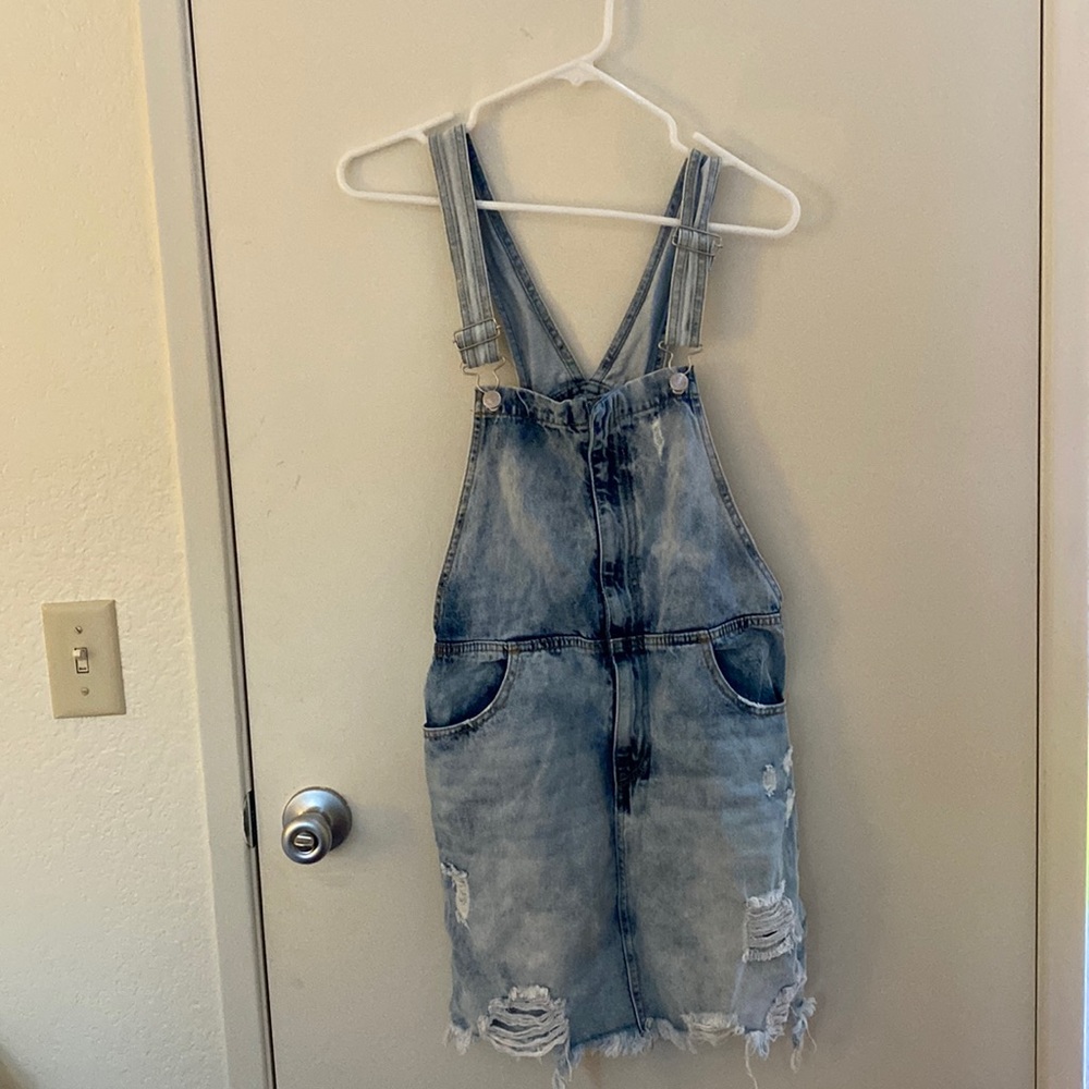 Overall dress in washed light denim! Super cute for stagecoach or summer